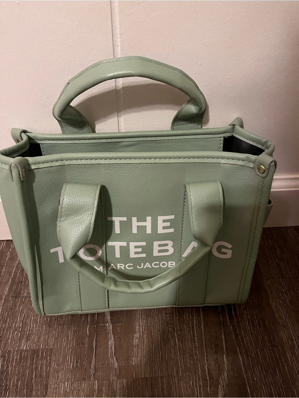 Sage green tote bag with top handles and an adjustable shoulder strap - Picture 4 of 10